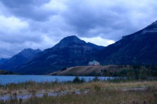 Prince of Wales Hotel lit up at night in Waterton Lakes National Park.