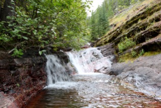Small waterfall on the Lower & Upper Rowe Lake trail in Waterton Lakes National Park.